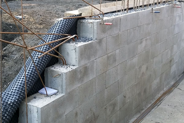 mur en blocs béton debry c. 